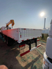 HOWO 6×4 crane truck with 10 ton telescopic crane